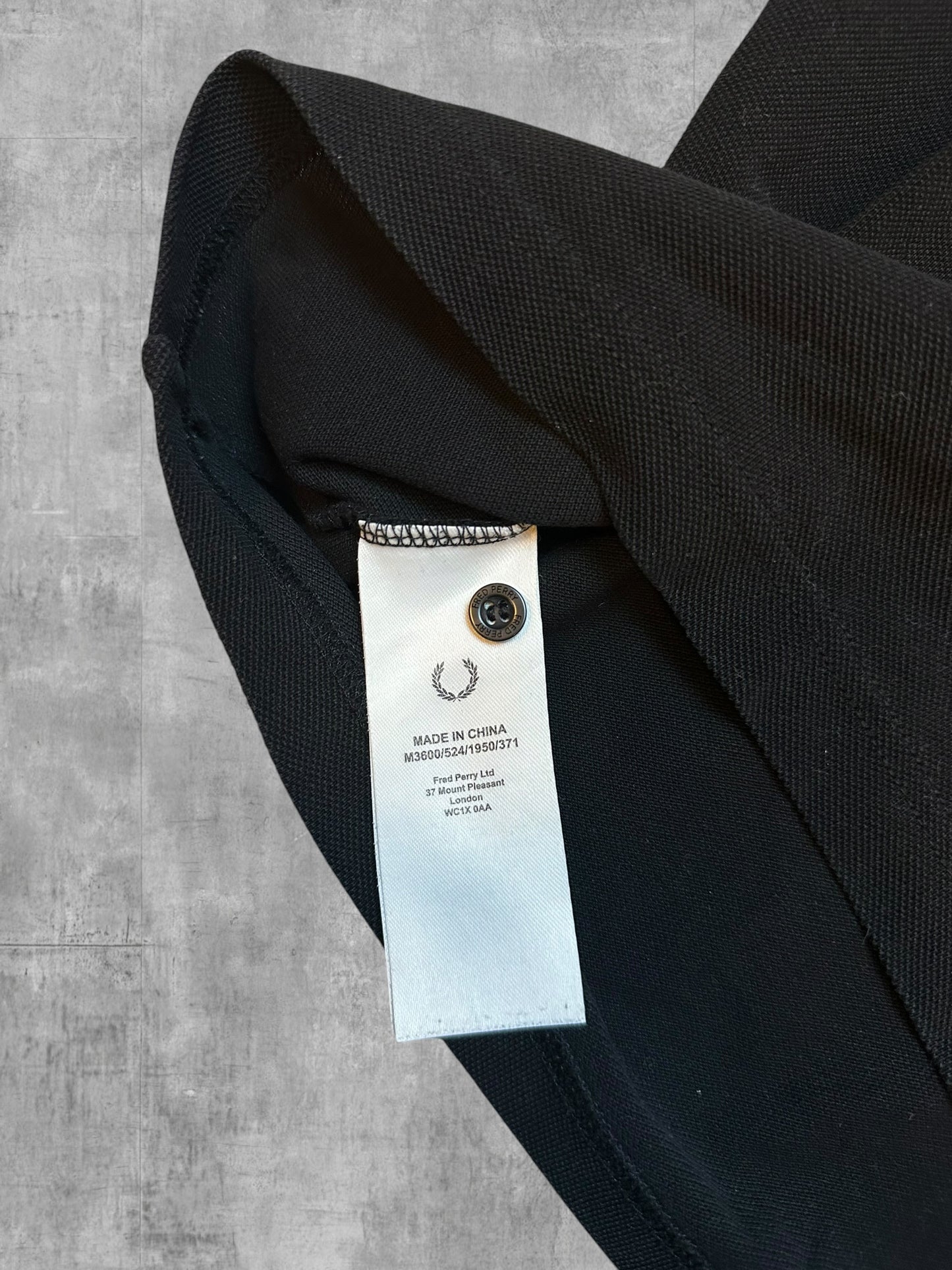 Fred Perry Poloshirt Schwarz M