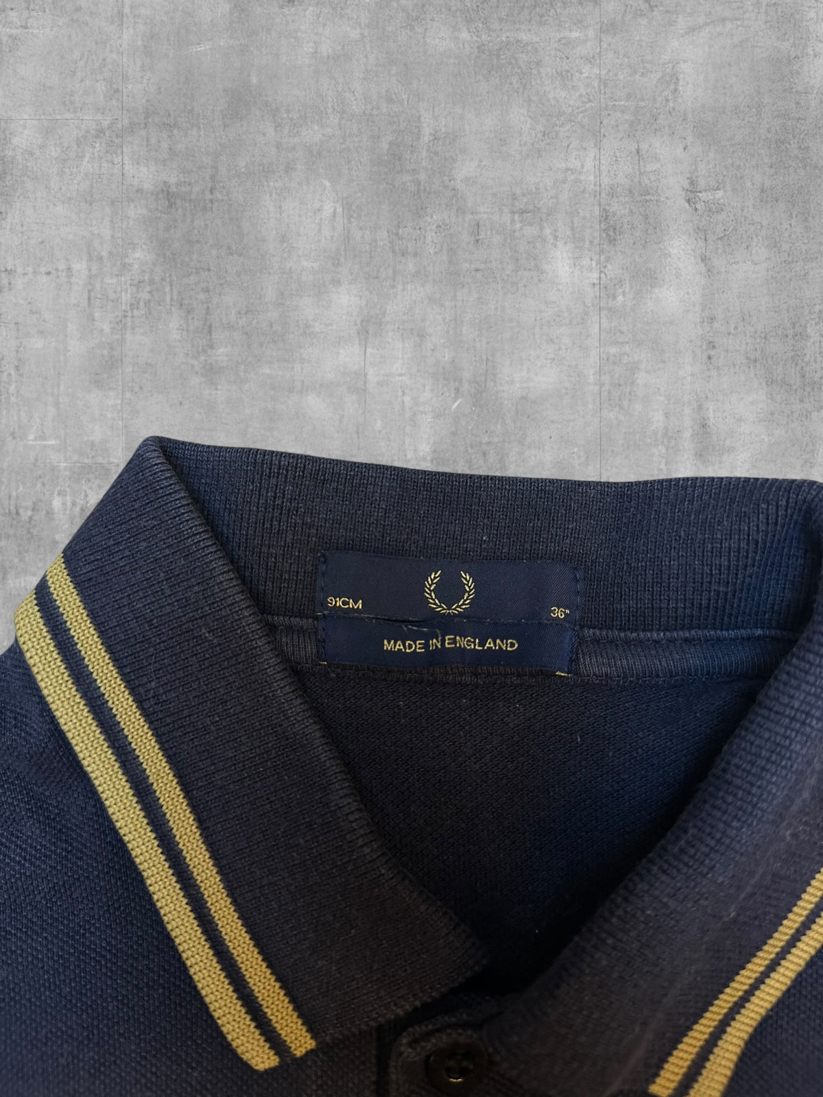 Fred Perry Poloshirt Schwarzblau Gold S